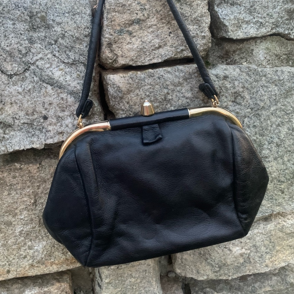 Black leather purse with floral lining